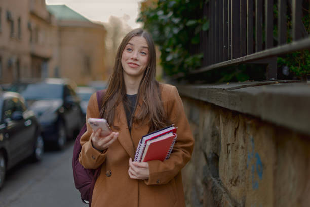 istock Female tourist student on city streets 2206355305