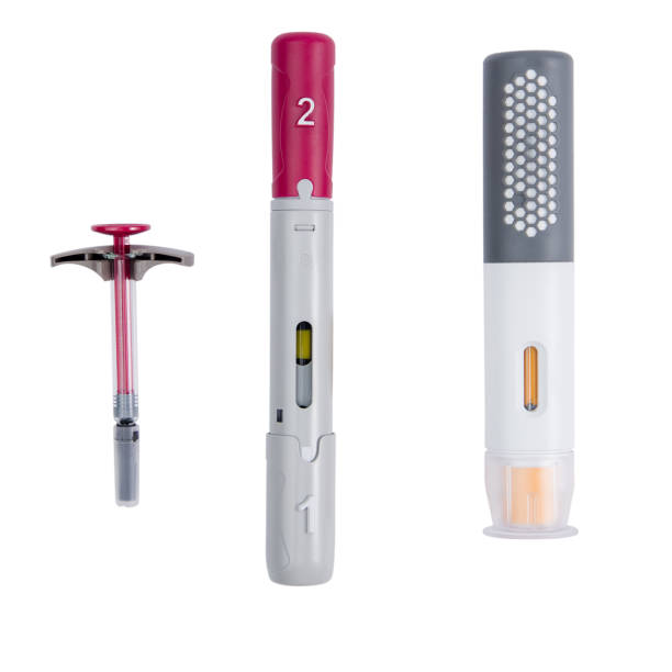 istock Injection pens and syringe isolated on white. 2206359355