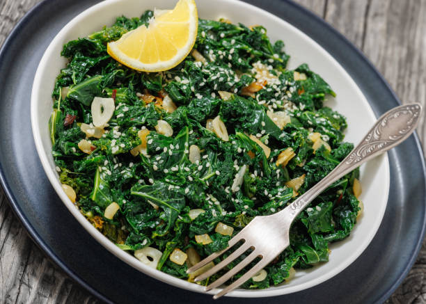 istock sauteed kale with garlic, onion, red pepper flakes 2206359968