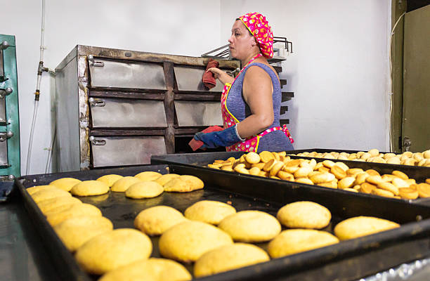 istock A woman baking Achira cakes 2206361729