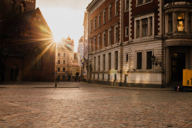 istock Sunlit European City Square with Historic Architecture 2206366519