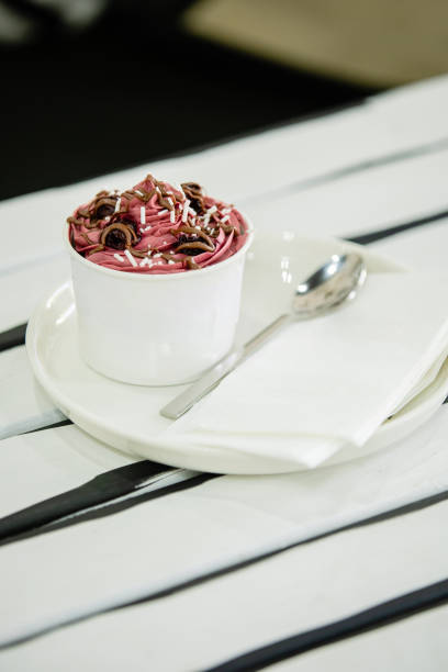 Berry smoothie bowl with strawberry, blueberry, red currant and chia seeds