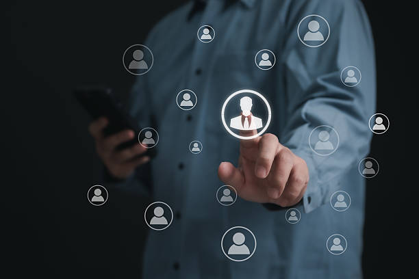 istock Recruitment people or Human Resource Management (HR) concept : Bussinessman using finger for choose human development recruitment leadership and customer target group to enter the position in company 2206367635