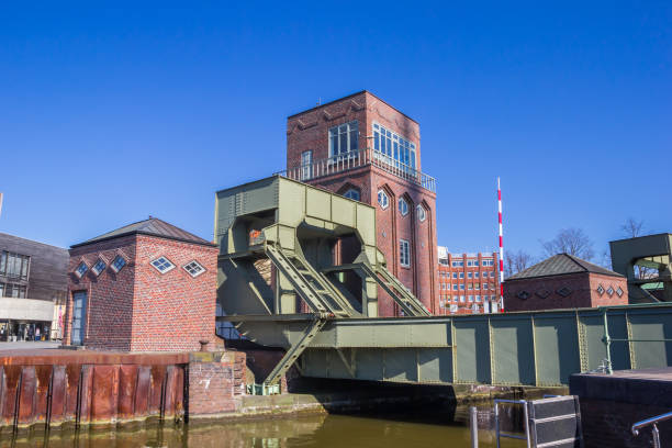 Historic steel bridge with brick tower in Bremerhaven, Germany
