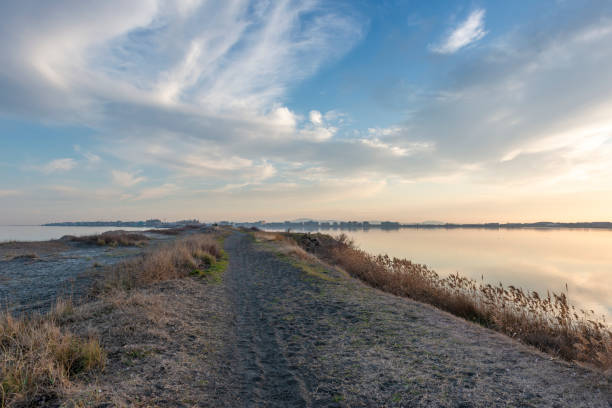 View at Pomorie town from the Pomorie's  sandspit between Black Sea and Pomorie's salt lake, at sunset. Bulgaria, Europe.