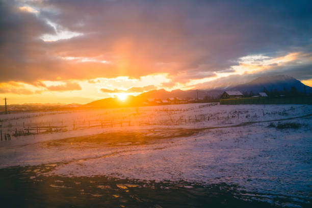Sun Shining Over The Snow In Romania .