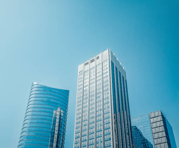 istock Three high-rise buildings with mirrored windows on a sunny day 2206381500