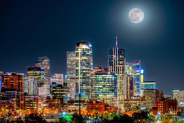 istock Downtown Denver Cityscape at Night with Full Moon Rising 2206381999