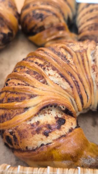istock Donuts are fried or baked pastries that have a texture similar to cake. 2206387806