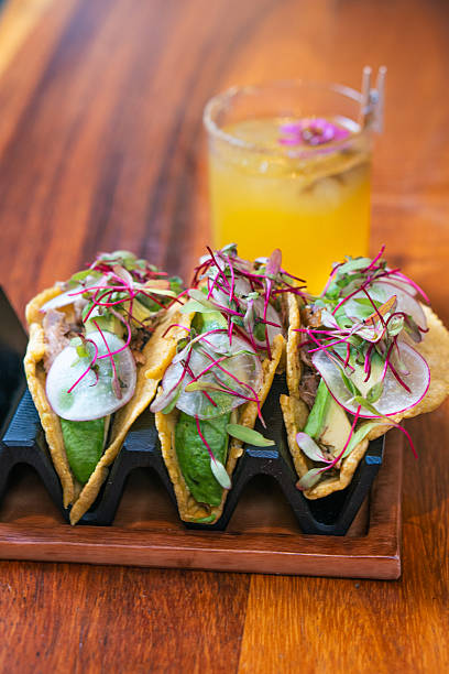 istock Gourmet tacos with microgreens and a refreshing drink in merida, yucatan 2206390454
