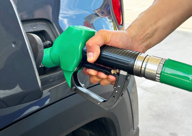 istock The process of refueling a passenger car through the tank cap 2206392997