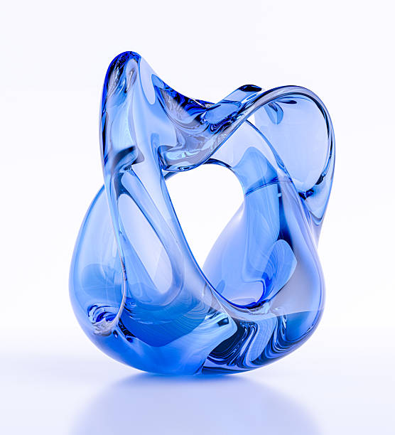 istock A modern and abstract sculpture from translucent blue glass. Flowing, twisting form creates an intriguing play of light and shadow, accentuating the smoothness of the material. The image conveys sophistication, artistry, and contemporary 3d rendering desi 2206397724