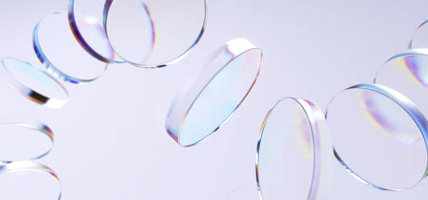 istock Transparent glass material discs levitation with a subtle rainbow iridescent caustic effect. 3d rendering abstract background 2206397769