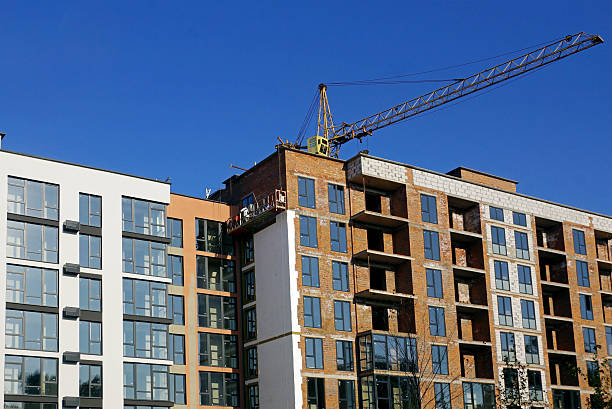 istock Construction of new modern multi-apartment residential complexes. 2206400402
