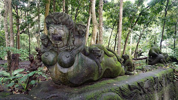 istock Statue at Ubud Monkey Forest - a sanctuary which is home to three Hindu temples Padangtegal, Ubud, Bali, Indonesia 2206402547