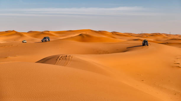 istock Cars crossing the Saudi desert 2206406358