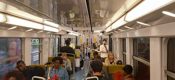 Paris, France - July 26, 2024: Charles De Gaulle Airport Train Station In Paris France Europe, People Sitting Down, Standing Inside France Public Transportation Train