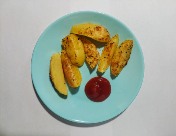 Crispy on the outside, tender on the inside—these golden potato wedges are seasoned with a blend of aromatic herbs and spices, then roasted to perfection. Served with a side of rich ketchup for a perfect balance of flavors.
