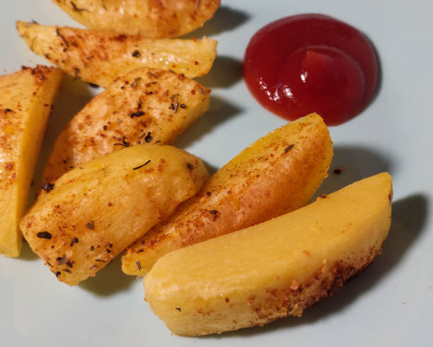 istock Golden Herb Potato Wedges 2206408210