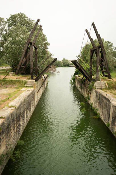 Langlois Bridge was a double-beam drawbridge on the Rhone River,  painted by van Gogh in 1888, Arles, France, Europe