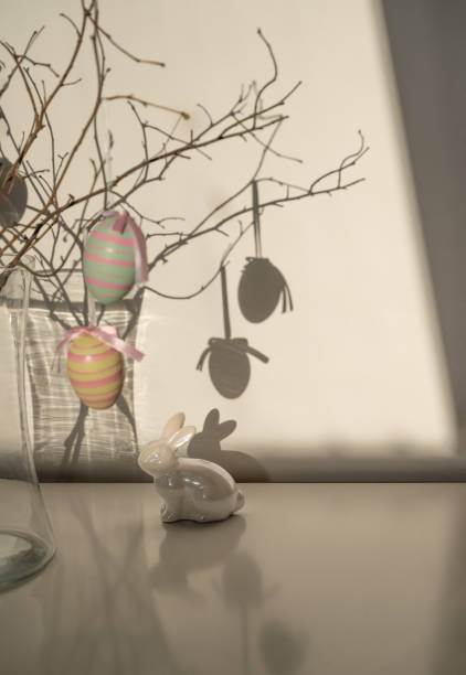 istock Minimalist Easter decoration with eggs and bunny figure 2206409922
