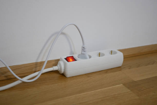 istock The electric cable is plugged into a power strip socket extension cord 2206415404