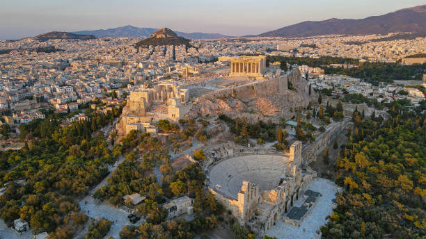 istock Parthenon and an ancient theater from the sky at sunset 2206420426