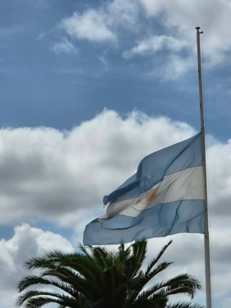 istock Argentine flag at half-mast in national mourning 2206420812