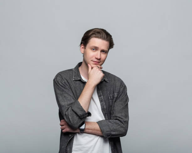 istock Portrait of confident young man 2206424570