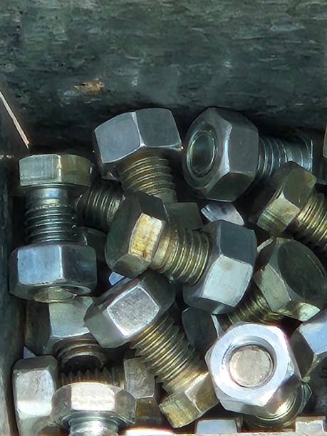istock box with metal nuts and screws 2206428758
