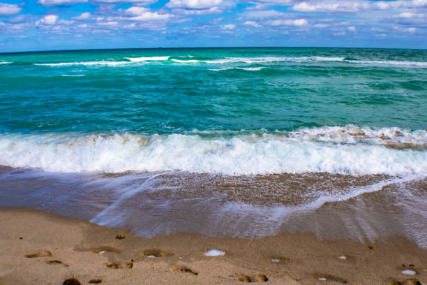 Golden beach, ocean waves, close up, Miami, USA