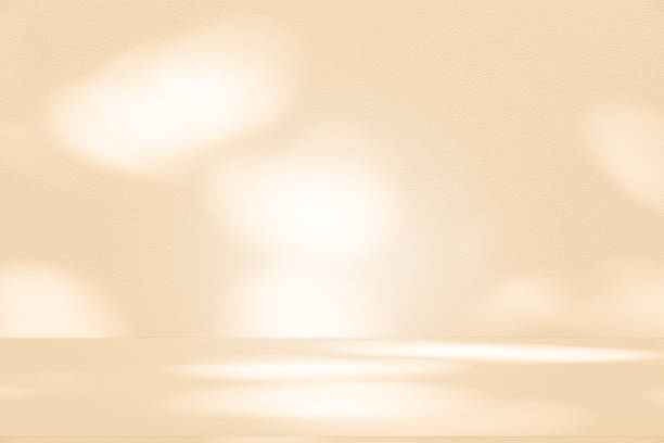 istock Studio style background wall decoration presentation uses white and beige tones. with shadows cast from a nearby window, concept creating a decorative 2206438212