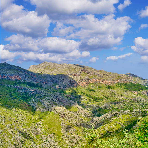 Serra de Tramuntana, Mallorca, Spain.  In 2011, UNESCO World Heritage Site status was awarded to Mallorcaâs magnificent Serra de Tramuntana. This impressive mountain range â almost 90km long â forms the backbone of Mallorca, and stretches from Andratx in the southwest to the Cap de Formentor in the far north of the island.