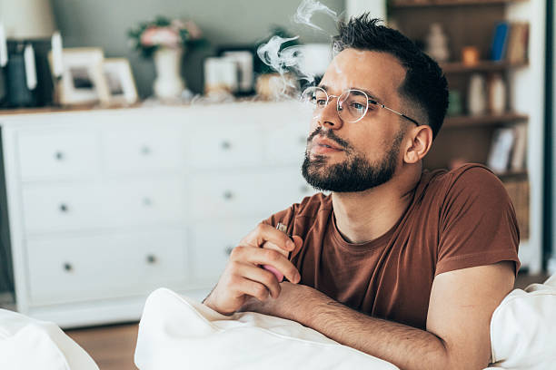 istock Casual Vaping in a Cozy Home 2206439602