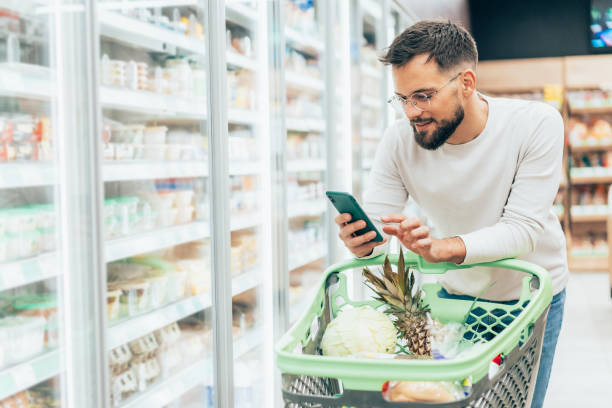 istock Handsome man shopping in supermarket 2206439617