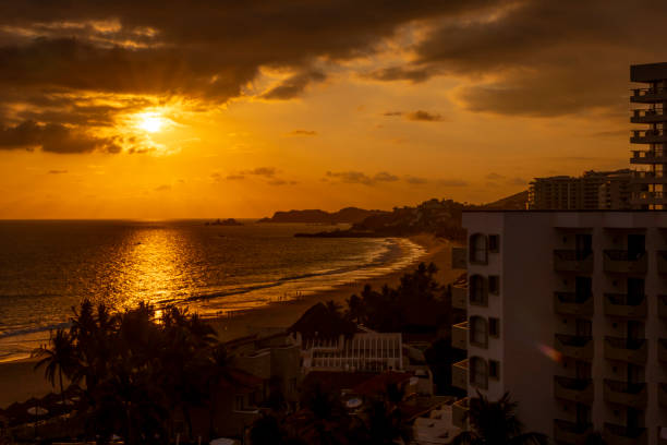 istock Pov watching golden hour on the beach 2206449515