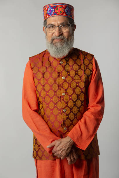 istock Old male leader smiling and standing on white background 2206455657