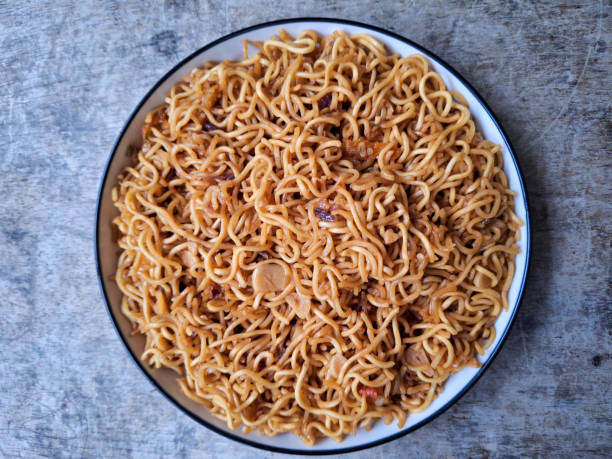 istock Mi Goreng Or Fried Noodle On A Plate. Food Menu. Top View. 2206461098