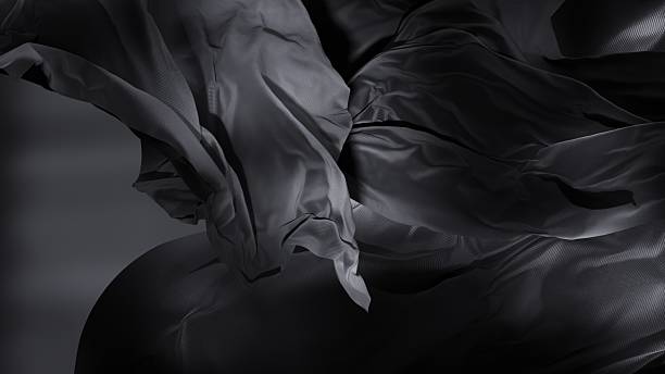istock Folds fall like quiet echoes in a black room. 2206461872