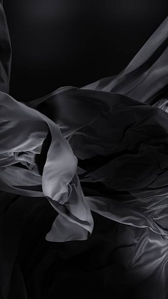 istock Like a silent tide, the fabric curls into shadow. 2206461896