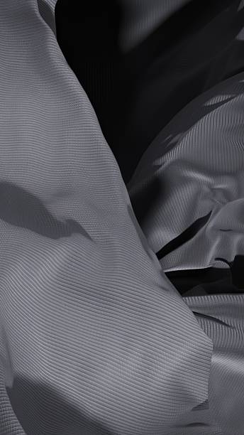istock The cloth swells like lungs inhaling stillness. 2206461934