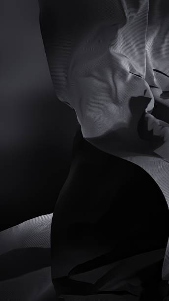 A cascade of shadows twists in solemn silence.