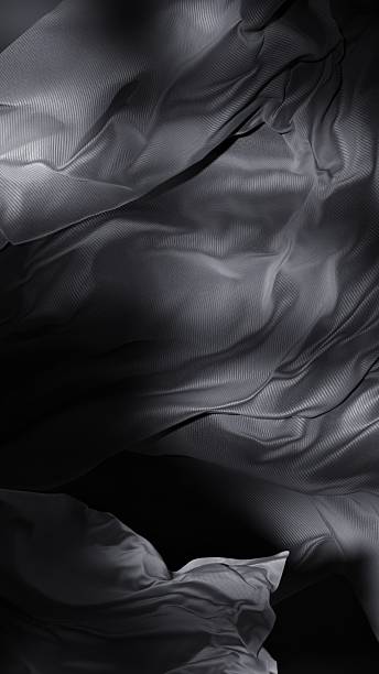 istock The cloth swirls like ink dropped into dusk. 2206462313