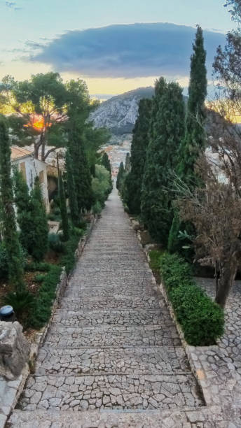 istock A stone walkway with a path called stairs of Calvary 2206463122