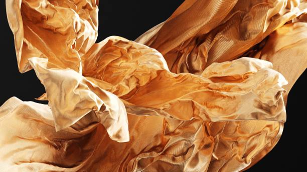 A golden fabric abstraction captured in mid-flow and light.