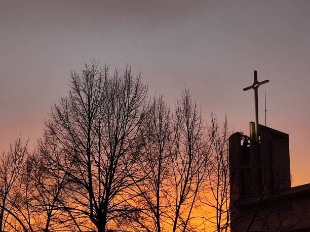 istock Sunset on the church 2206465395