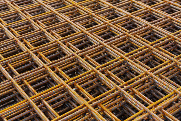 istock Stacked steel rebar grids for construction projects showing industrial texture and structural foundation detail 2206466169