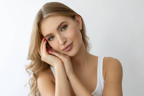 istock Beautiful female standing against white background 2206470273