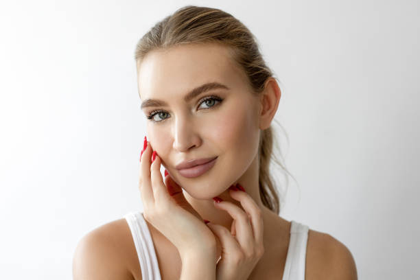 istock Beautiful female standing against white background 2206470428