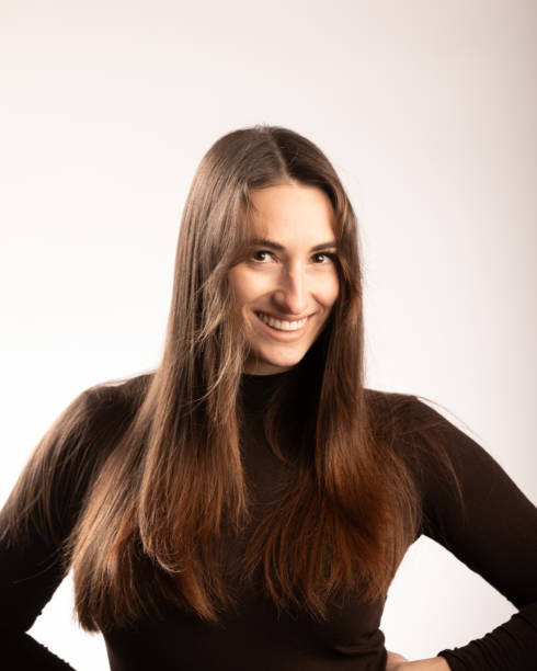 istock Smiling Long straight hair brunette portrait 2206473364